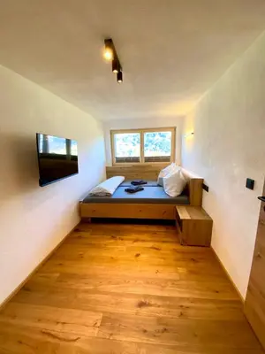 Ein Bett oder Betten in einem Zimmer der Unterkunft Appartement Hirner