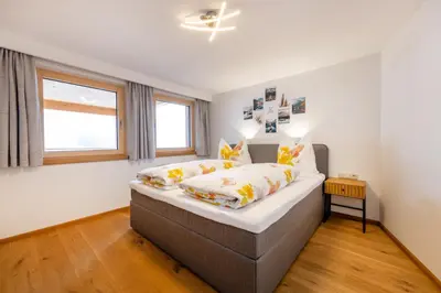 Ein Bett oder Betten in einem Zimmer der Unterkunft Ferienwohnung Gipfelreich