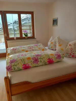 Ein Bett oder Betten in einem Zimmer der Unterkunft Haus am Waldrand
