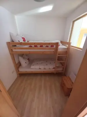 Ein Bett oder Betten in einem Zimmer der Unterkunft Haus am Waldrand