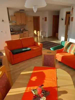 Ein Sitzbereich in der Unterkunft Haus am Waldrand