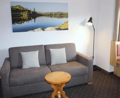 Ein Sitzbereich in der Unterkunft Appartements Lisa