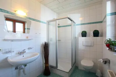 Ein Badezimmer in der Unterkunft Appartements Lisa