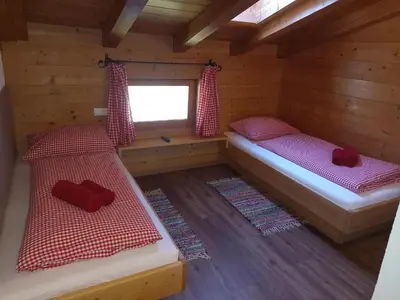 Ein Bett oder Betten in einem Zimmer der Unterkunft Hennleiten Hof