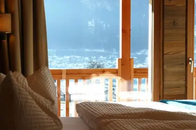 Ein Bett oder Betten in einem Zimmer der Unterkunft Chalet - Das Schrofen
