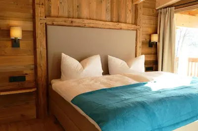 Ein Bett oder Betten in einem Zimmer der Unterkunft Chalet - Das Schrofen