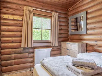 Ein Bett oder Betten in einem Zimmer der Unterkunft im Brixental II
