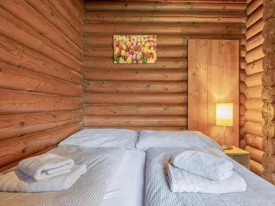 Ein Bett oder Betten in einem Zimmer der Unterkunft im Brixental II