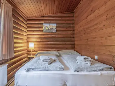 Ein Bett oder Betten in einem Zimmer der Unterkunft im Brixental II