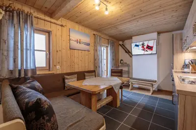 Ein Sitzbereich in der Unterkunft Appartements Grünholz
