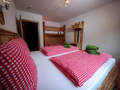 Ein Bett oder Betten in einem Zimmer der Unterkunft Ferienhaus Höllwarth