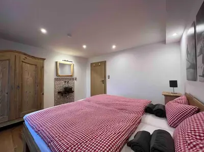 Ein Bett oder Betten in einem Zimmer der Unterkunft Haus Tupferl
