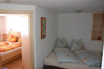 Ein Bett oder Betten in einem Zimmer der Unterkunft Leitnerhof