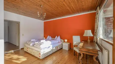 Ein Bett oder Betten in einem Zimmer der Unterkunft Apartment auf dem Schlossberg - Bergblick
