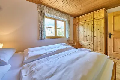 Ein Bett oder Betten in einem Zimmer der Unterkunft Chalet Apartments Ferius inklusive Jokercard im Sommer