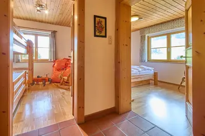 Ein Bett oder Betten in einem Zimmer der Unterkunft Chalet Apartments Ferius inklusive Jokercard im Sommer