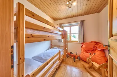 Ein Bett oder Betten in einem Zimmer der Unterkunft Chalet Apartments Ferius inklusive Jokercard im Sommer