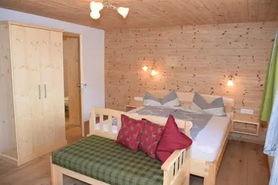 Ein Bett oder Betten in einem Zimmer der Unterkunft Pension Biobauernhof Hinteraltensberg