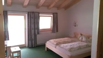Ein Bett oder Betten in einem Zimmer der Unterkunft Pension Biobauernhof Hinteraltensberg