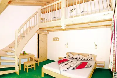 Ein Bett oder Betten in einem Zimmer der Unterkunft Pension Biobauernhof Hinteraltensberg