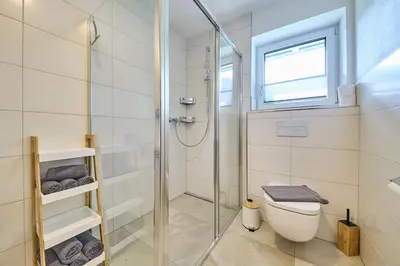 Ein Badezimmer in der Unterkunft Haus Joan - Apartments
