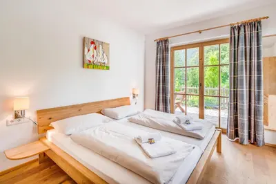 Ein Bett oder Betten in einem Zimmer der Unterkunft Chalet #16 am Sonnenhang