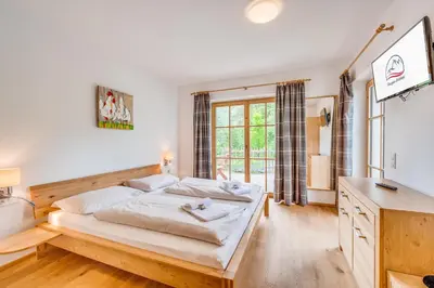 Ein Bett oder Betten in einem Zimmer der Unterkunft Chalet #16 am Sonnenhang