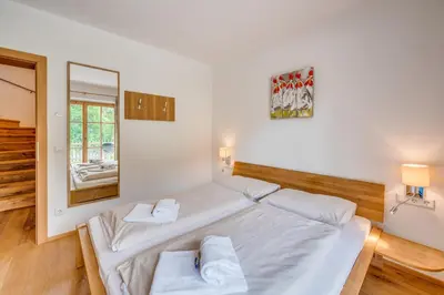Ein Bett oder Betten in einem Zimmer der Unterkunft Chalet #16 am Sonnenhang