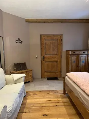 Ein Bett oder Betten in einem Zimmer der Unterkunft Zimmer in Kirchberg in Tirol