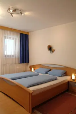 Ein Bett oder Betten in einem Zimmer der Unterkunft Landhaus Stefanie