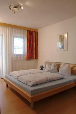 Ein Bett oder Betten in einem Zimmer der Unterkunft Landhaus Stefanie
