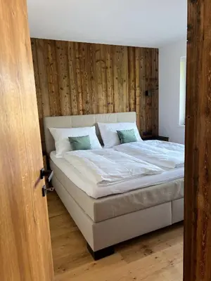 Ein Bett oder Betten in einem Zimmer der Unterkunft GreenView Appartement