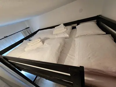 Ein Bett oder Betten in einem Zimmer der Unterkunft NĀVA PLACE Small & Cozy Studio in Hinterglemm - 650 m to Ski Lift, Wifi