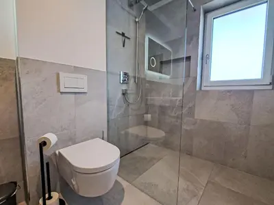 Ein Badezimmer in der Unterkunft Apartment Alpine Residence Auszeit-1 by Interhome