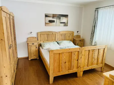 Ein Bett oder Betten in einem Zimmer der Unterkunft Ferienwohnung Martina