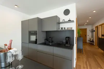 Küche/Küchenzeile in der Unterkunft Apartment Seeglück am Walchsee - sehr stylisch, zentral und neuerbaut