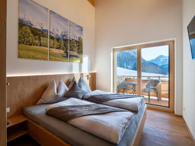 Ein Bett oder Betten in einem Zimmer der Unterkunft Appartements Kafmahof