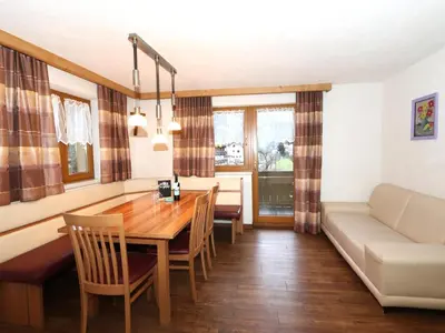 Ein Sitzbereich in der Unterkunft Apartment Höllwarth