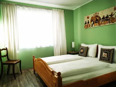 Ein Bett oder Betten in einem Zimmer der Unterkunft Zuhause bei Aurora