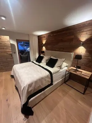 Ein Bett oder Betten in einem Zimmer der Unterkunft Spa, Sport & City Luxury Ski-in Ski-Out Apartment
