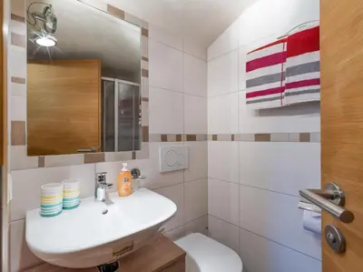 Ein Badezimmer in der Unterkunft Gästehaus Schwaiger - Lendgasse