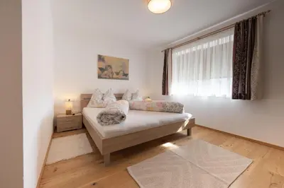 Ein Bett oder Betten in einem Zimmer der Unterkunft Gästehaus Schwaiger - Lendgasse