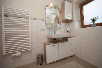 Ein Badezimmer in der Unterkunft Gästehaus Schwaiger - Lendgasse