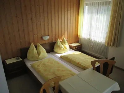 Ein Bett oder Betten in einem Zimmer der Unterkunft Haus Bergfried