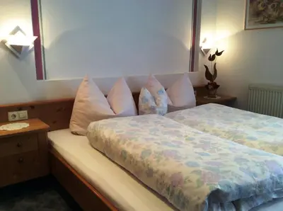 Ein Bett oder Betten in einem Zimmer der Unterkunft Der Klaushof