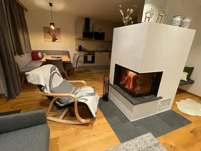 Ein Sitzbereich in der Unterkunft Chalet Buchensteinwand Luxusapartment mit Sauna am Berg