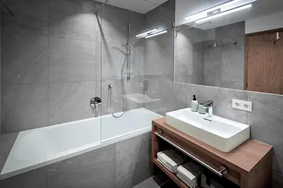 Ein Badezimmer in der Unterkunft Chalet Buchensteinwand Luxusapartment mit Sauna am Berg