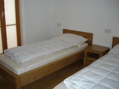 Ein Bett oder Betten in einem Zimmer der Unterkunft Duxeranger D Top 3