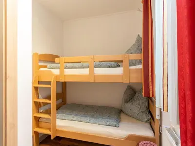 Ein Bett oder Betten in einem Zimmer der Unterkunft Apartment Neukirchen near Ski Slopes