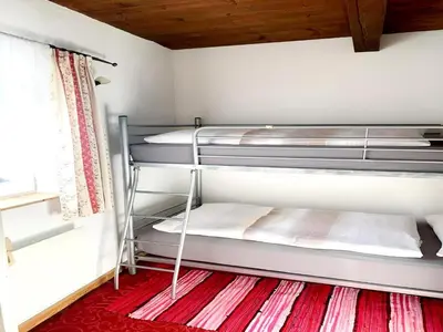 Ein Bett oder Betten in einem Zimmer der Unterkunft Farmhouse in Hollersbach near KitzSki